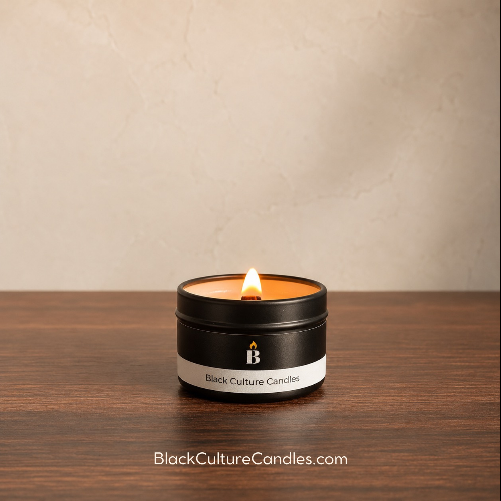 Black Culture Candles 2 oz sampler tin burning with a crackling wood wick, coconut apricot wax, and a soft flame for a clean artisan candle experience.