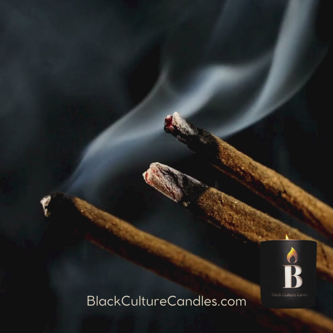Hand-poured Black Love candle in etched matte black glass, 8oz or 13oz. Vegan coconut apricot wax and a crackling wood wick, with notes of orchid, sandalwood, musk, amber, and tonka bean and slow crafted to honor connection, care, and culture.