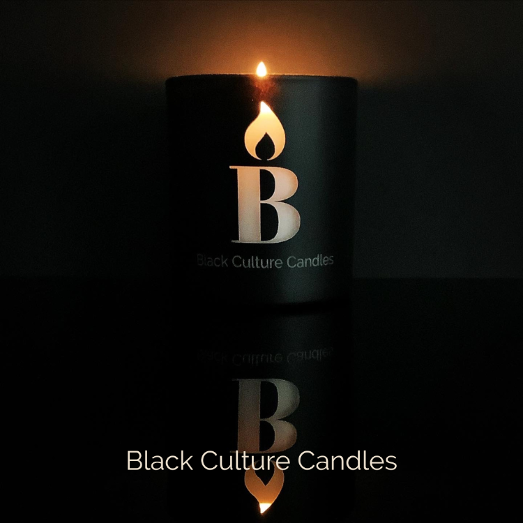 Black Joy luxury scented candle in etched glass with notes of citrus, pineapple, and amber—handcrafted with non-toxic wax and a crackling wood wick. A vibrant scent inspired by Black cultural joy, sunshine, and connection.