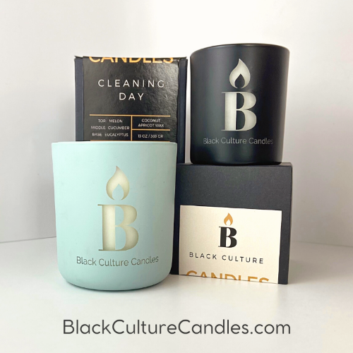 Black Culture Candles Cleaning Day candle collection showing 13oz matte light blue and 8oz matte black etched glass vessels with gift box