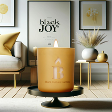 Load image into Gallery viewer, Experience a Burst of Tropical Energy with a Black Joy Candle by Black Culture Candles. Let the invigorating notes of citrus and light florals transport you to warm, bright summer days. This luxury handcrafted candle, made with the highest quality non-toxic ingredients, celebrates the rich and vibrant history of Black joy, culture, and connection. Proudly crafted in Akron, OH.
