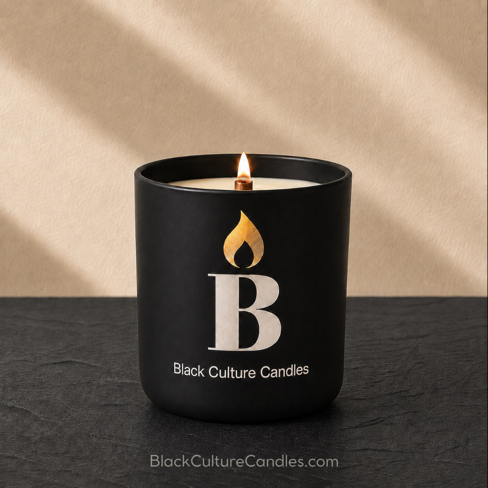 Black Love Candle by Black Culture Candles in a Black Matte Glass etched jar on a black slate surface with beige shadowed background.