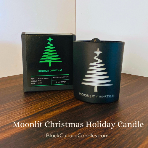 Moonlit Christmas Candle by Black Culture Candles® — a luxury artisan candle in matte black etched glass with a minimalist Christmas tree design. Handcrafted with a coconut apricot wax blend and sustainably sourced wood wick, this elegant holiday candle captures soft florals, fir, and sugar notes for a warm, modern Christmas scent experience.