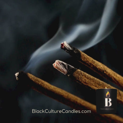 Hand-poured Black Love candle in etched matte black glass, 8oz or 13oz. Vegan coconut apricot wax and a crackling wood wick, with notes of orchid, sandalwood, musk, amber, and tonka bean and slow crafted to honor connection, care, and culture.