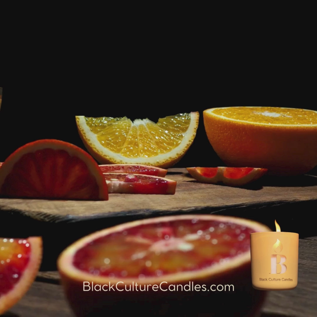 Black Joy luxury scented candle in etched glass with notes of citrus, pineapple, and amber—handcrafted with non-toxic wax and a crackling wood wick. A vibrant scent inspired by Black cultural joy, sunshine, and connection.
